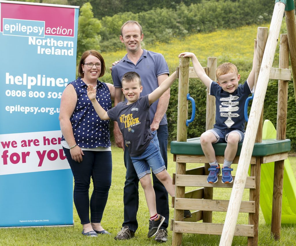 Family outdoors at an Epilepsy Action event.