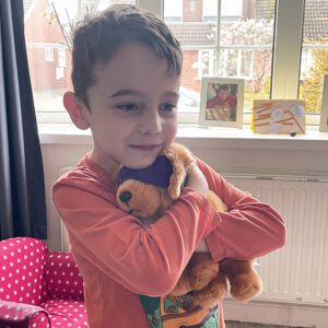 Zach with the Purple Day dog Super Trooper